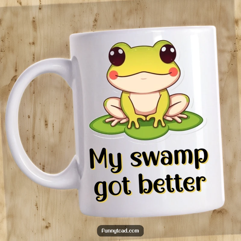 Funny mug featuring a stylized toad with big, bulging dot eyes resting peacefully on a green lily pad. A humorous and cute design.